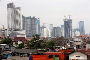 Vor allem die Städte wachsen, wie hier in Indonesien. (Foto: dpa)
