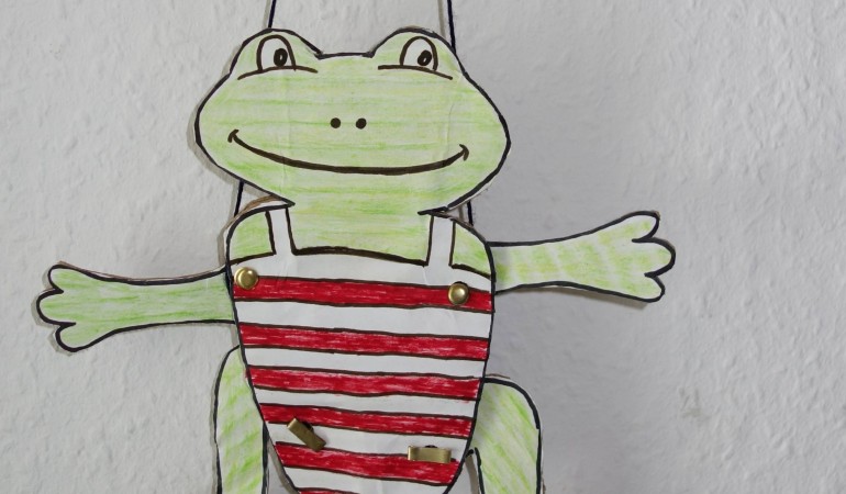Ein Frosch mit wackelnden Armen