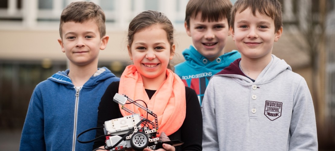 Schüler bauen Schweini-Bot