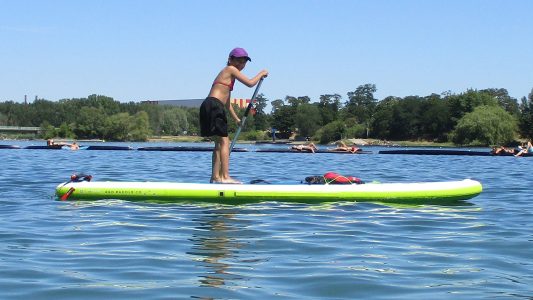 Über das Wasser gleiten – Stand Up Paddling